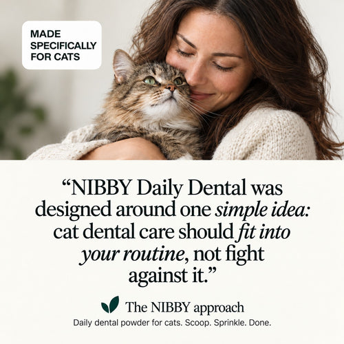 Woman hugging her cat: the NIBBY approach to daily dental care